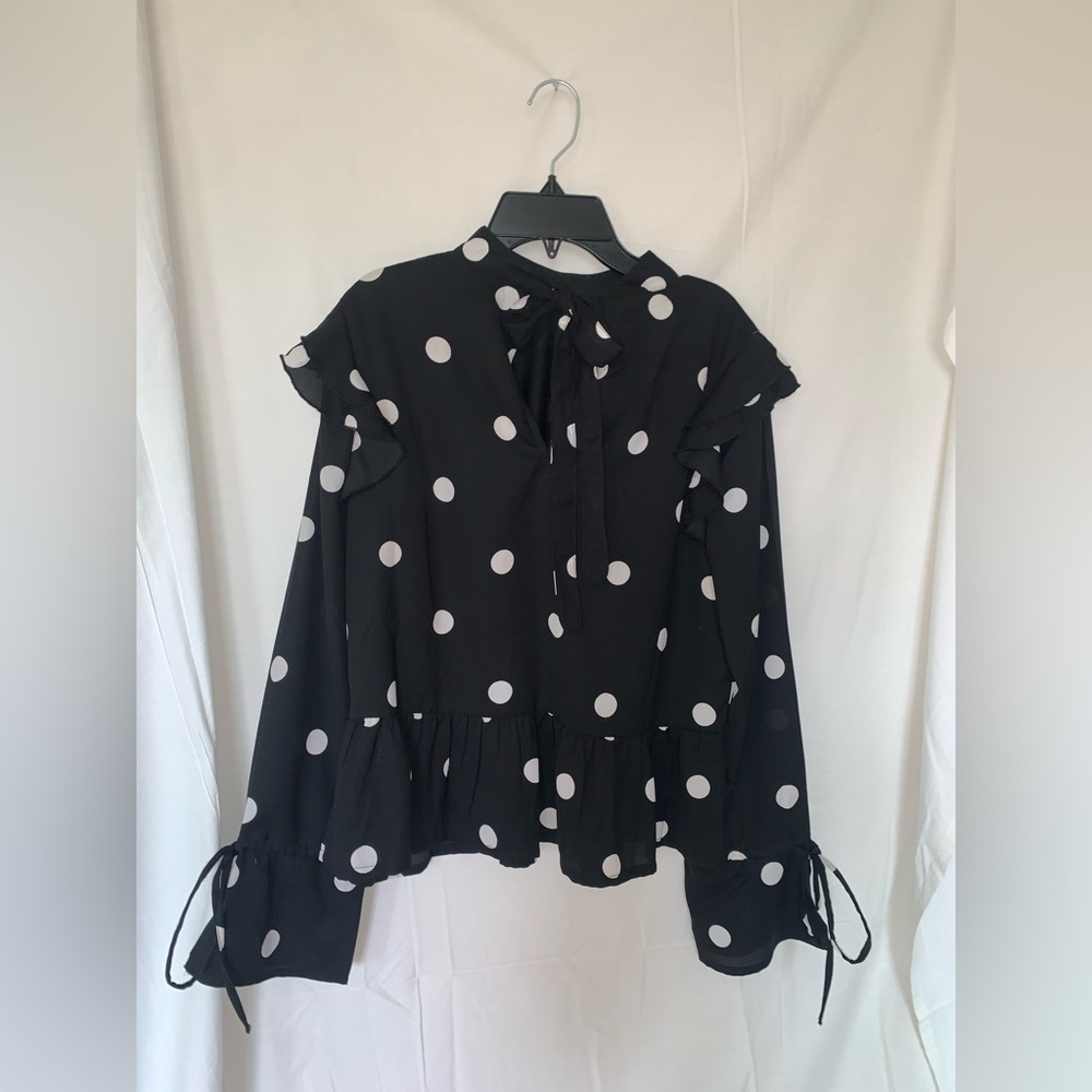 Black and white polka dot long sleeve blouse top